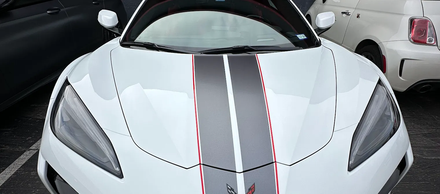 White Corvette with racing stripes