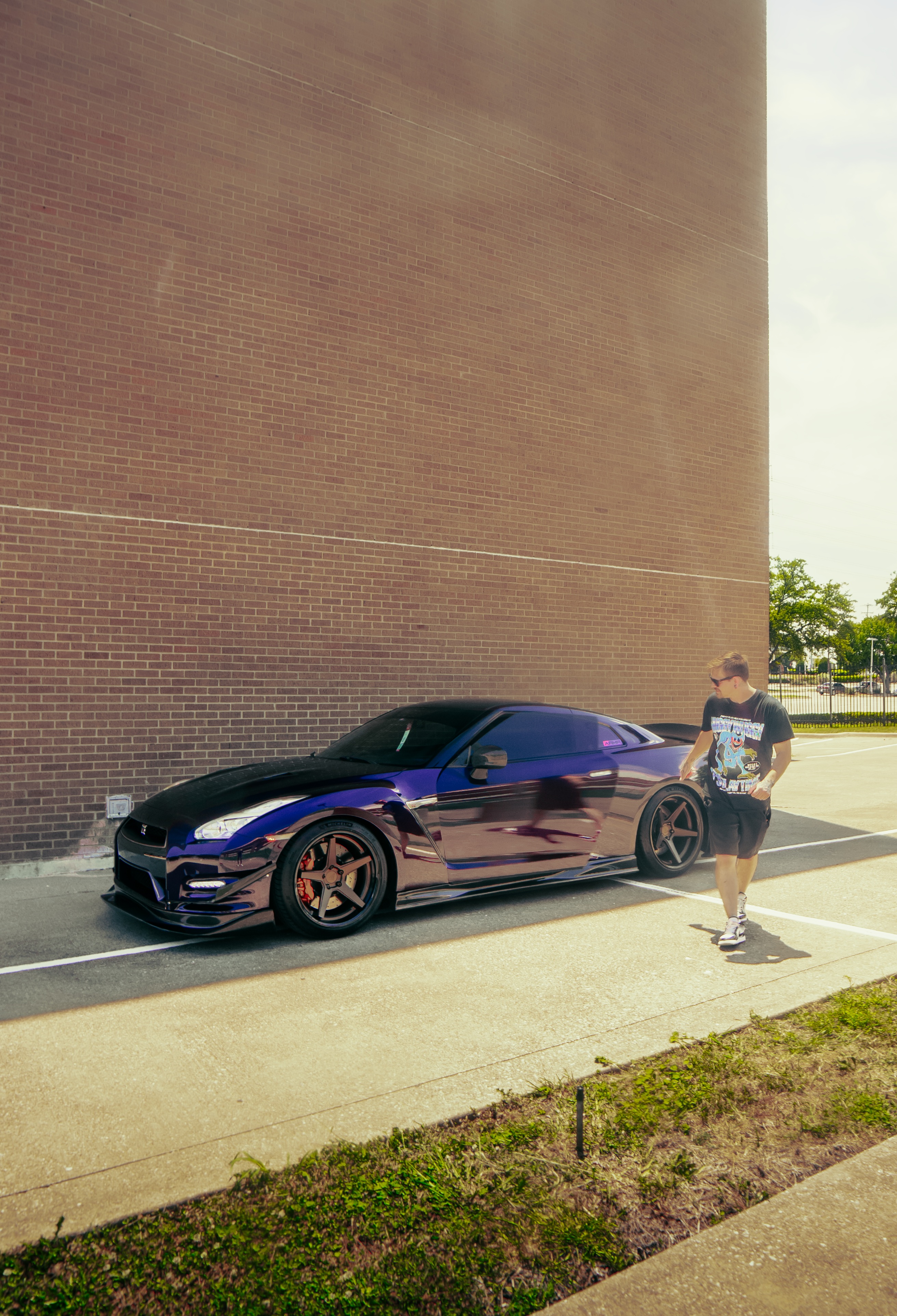 Purple chrome GT-R at handoff after detailing at the Wraps Redefined studio