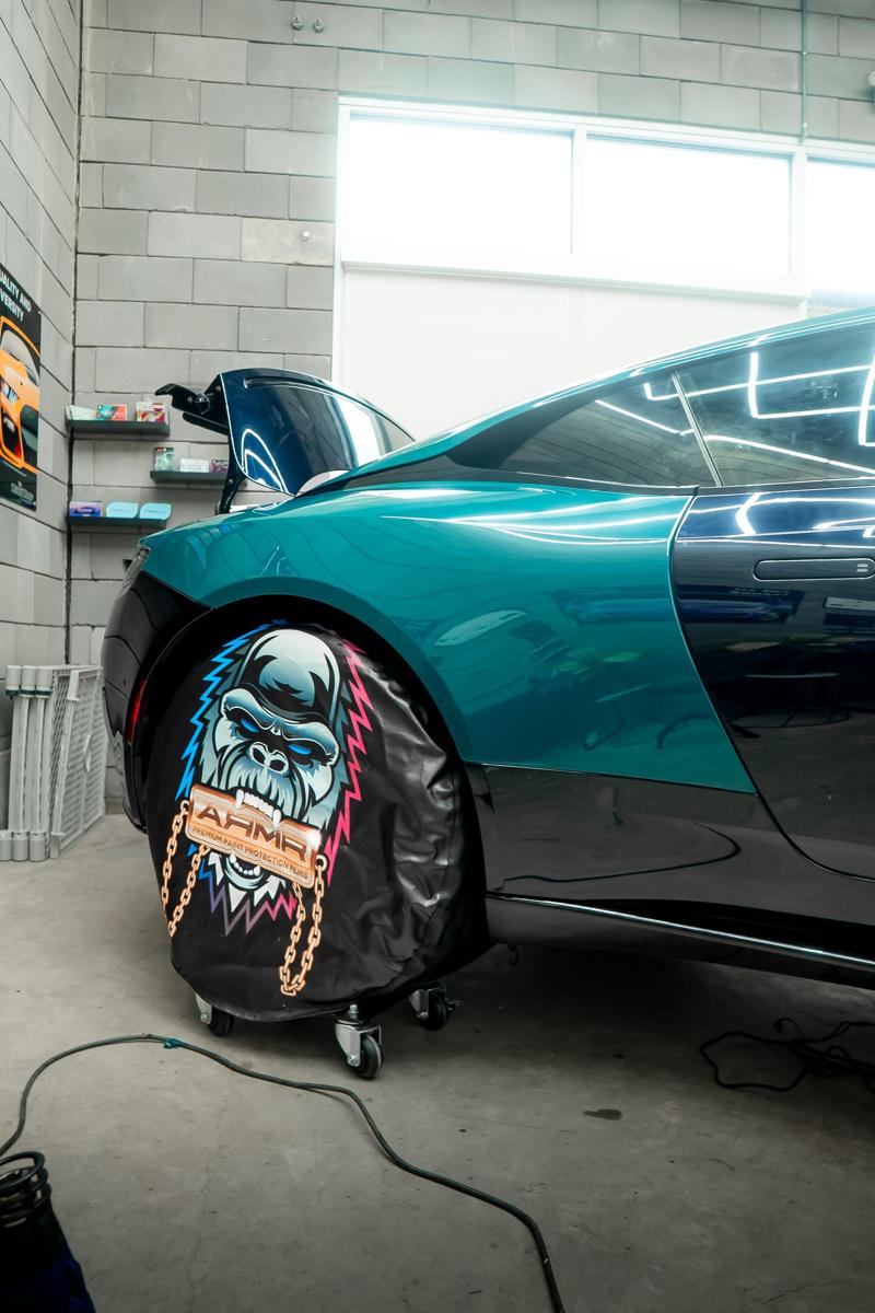 The Aston Martin mid install, panels in teal film