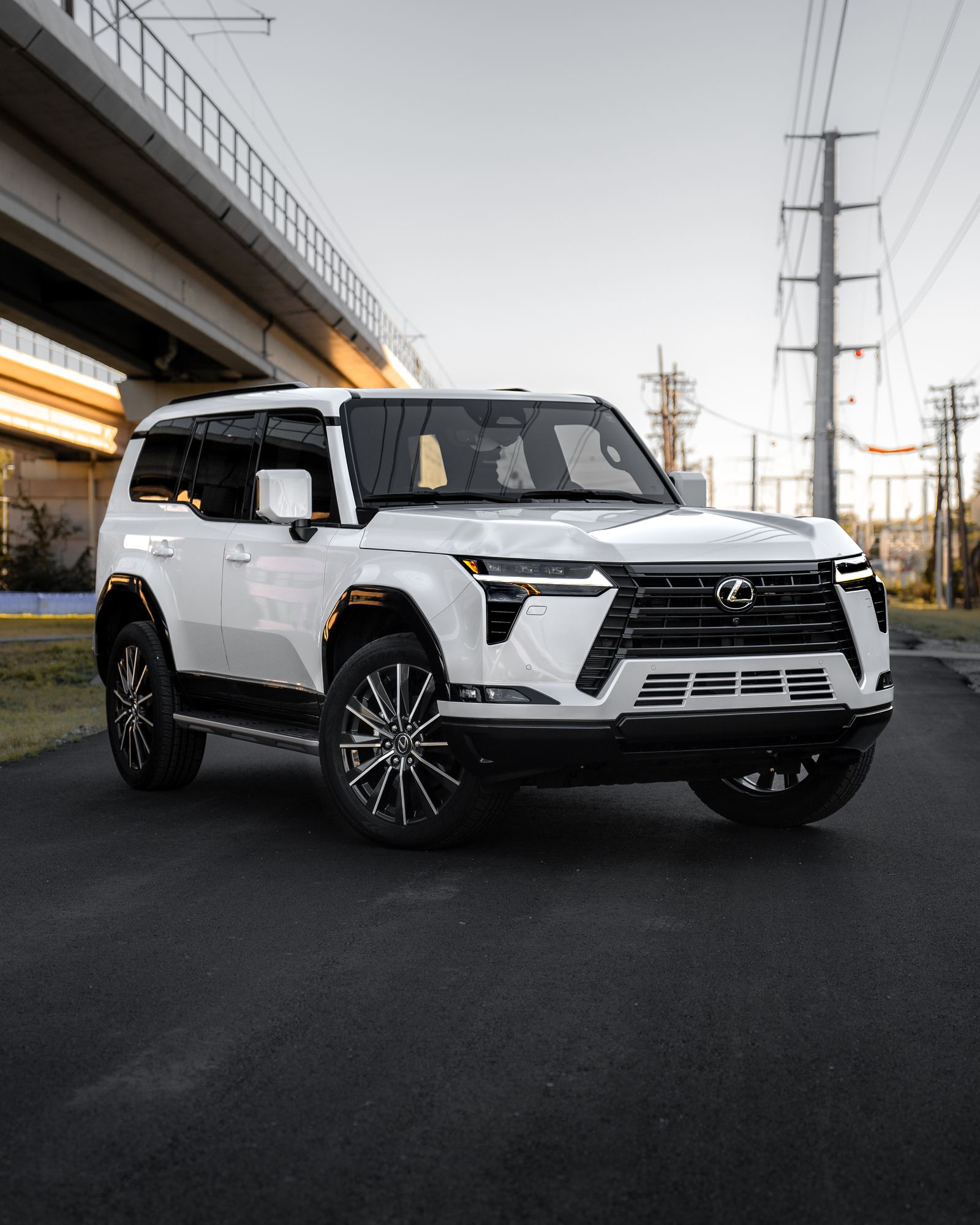 White luxury SUV with blacked out trim and chrome delete