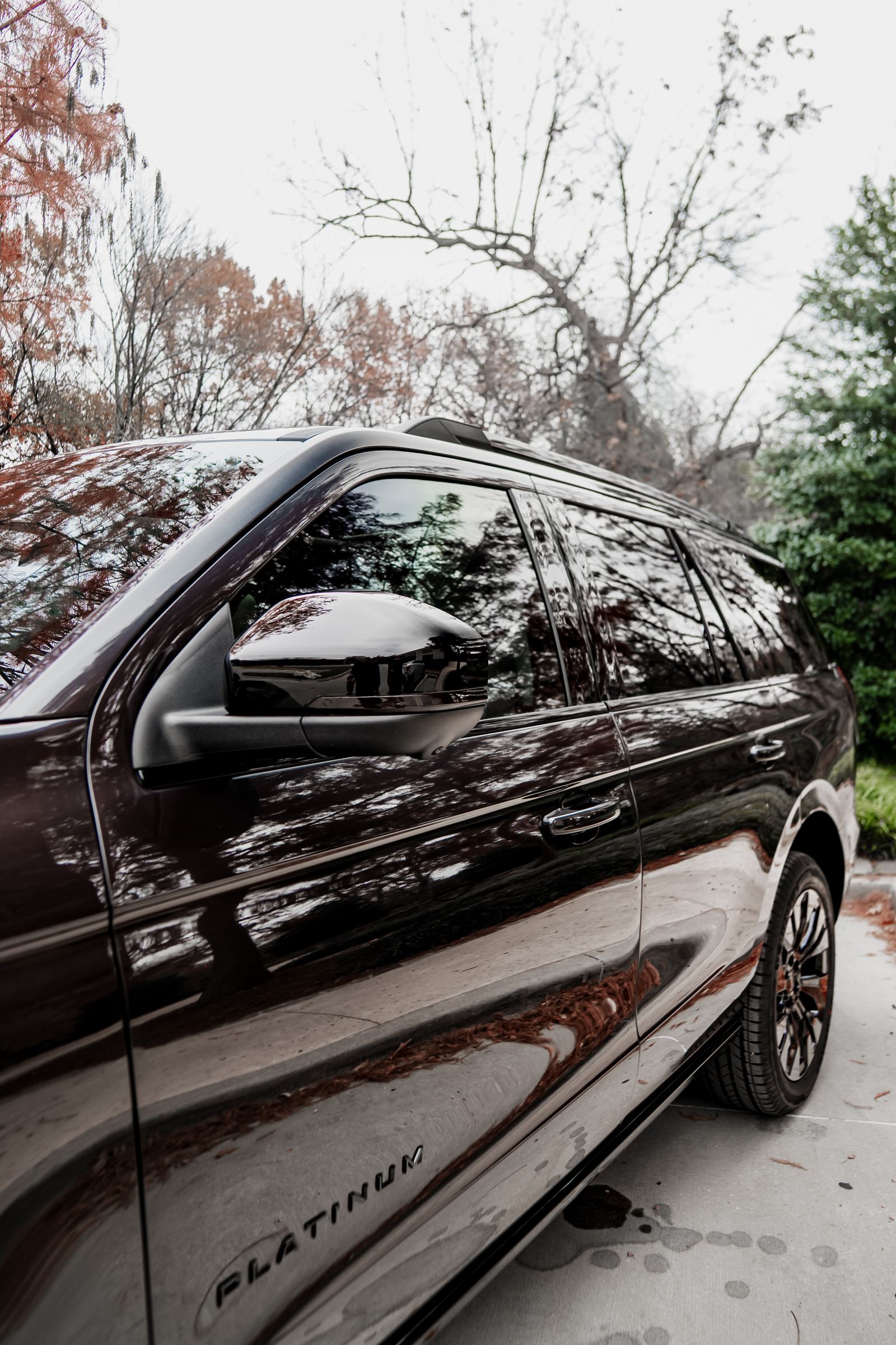 Black SUV with dark tinted windows in Dallas