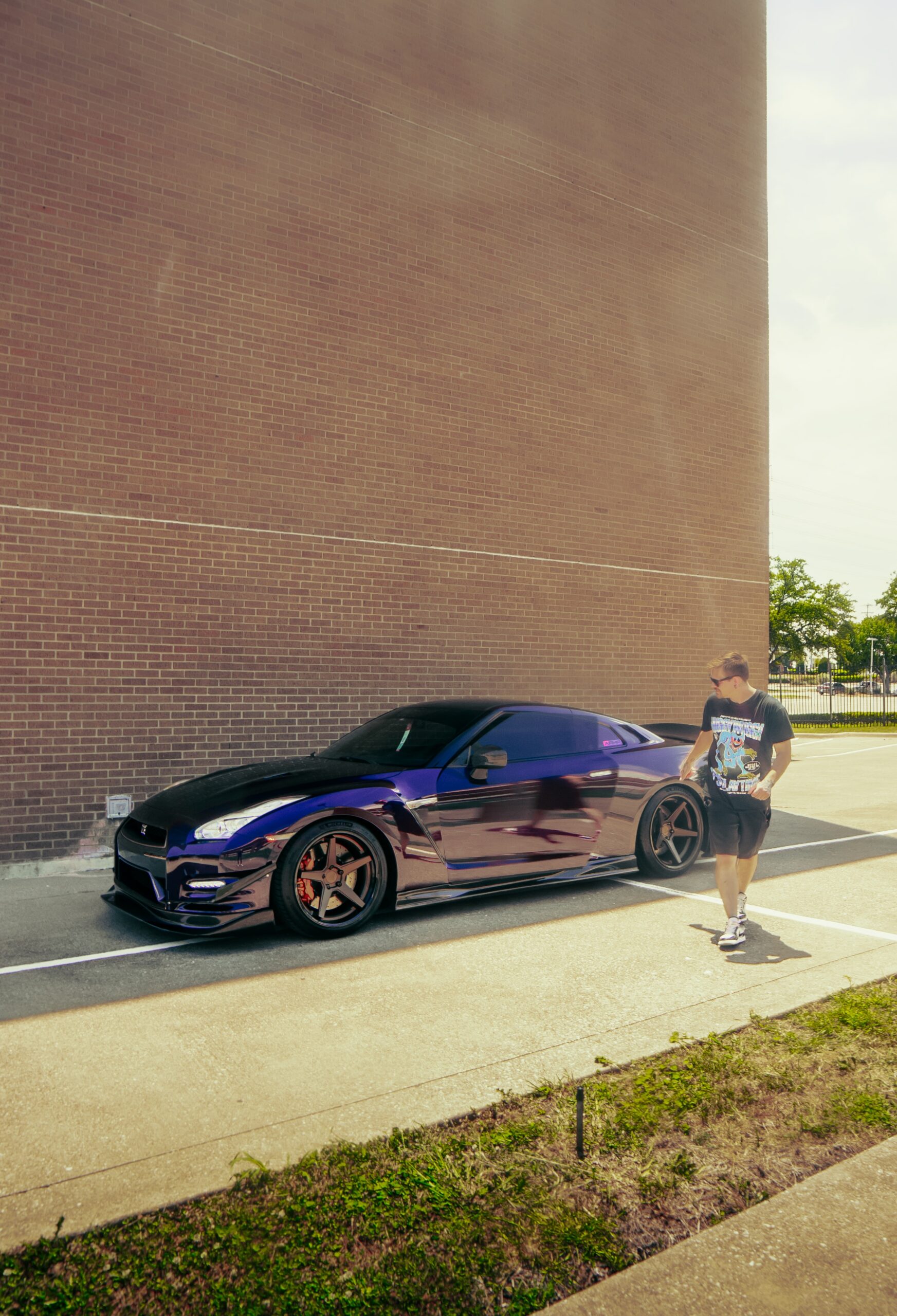 Purple chrome GT-R at handoff after detailing at the Wraps Redefined studio