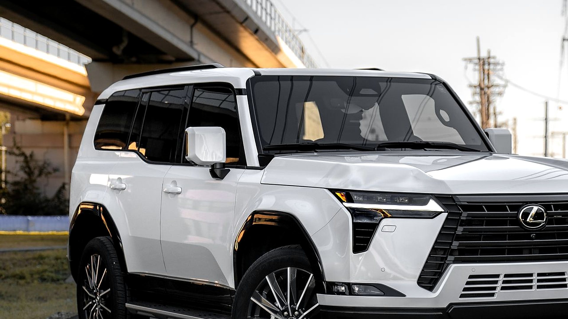 White luxury SUV with a full chrome delete blackout package