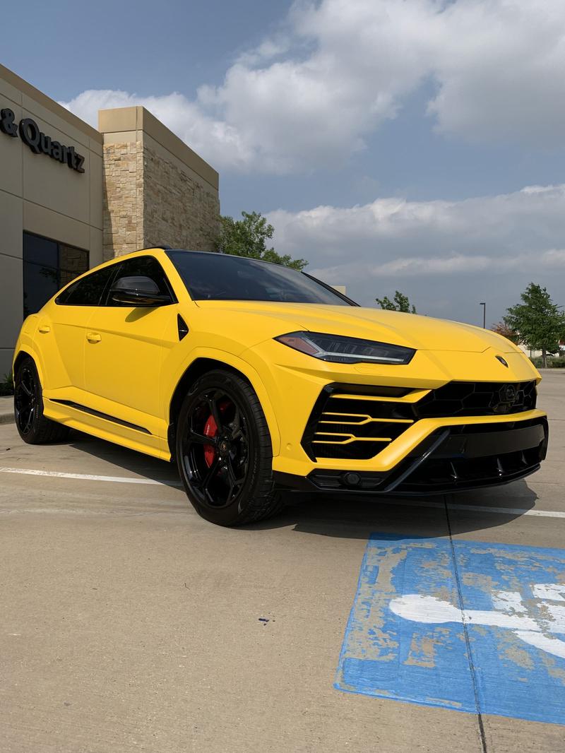Yellow performance SUV protected at Wraps Redefined