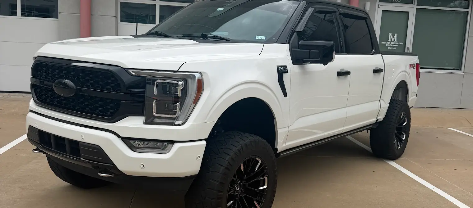 White F-150 with blackout package