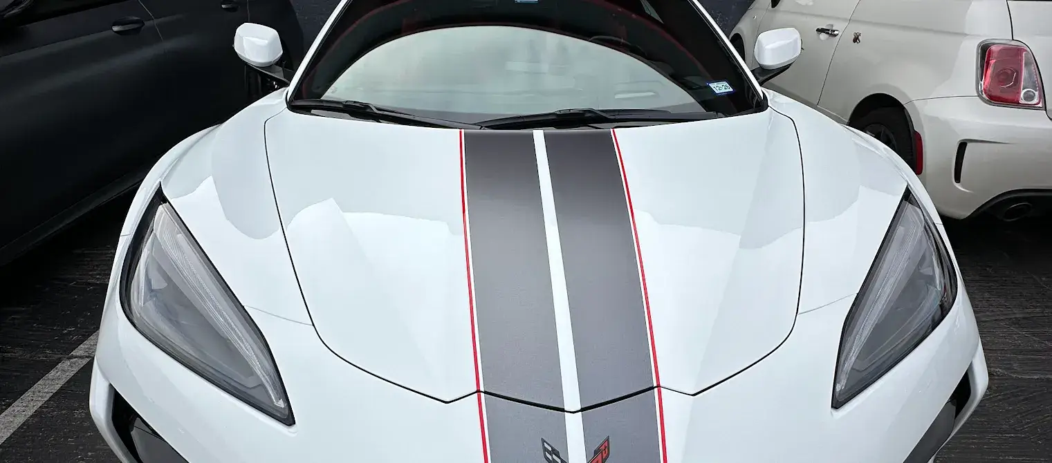 White Corvette with racing stripes