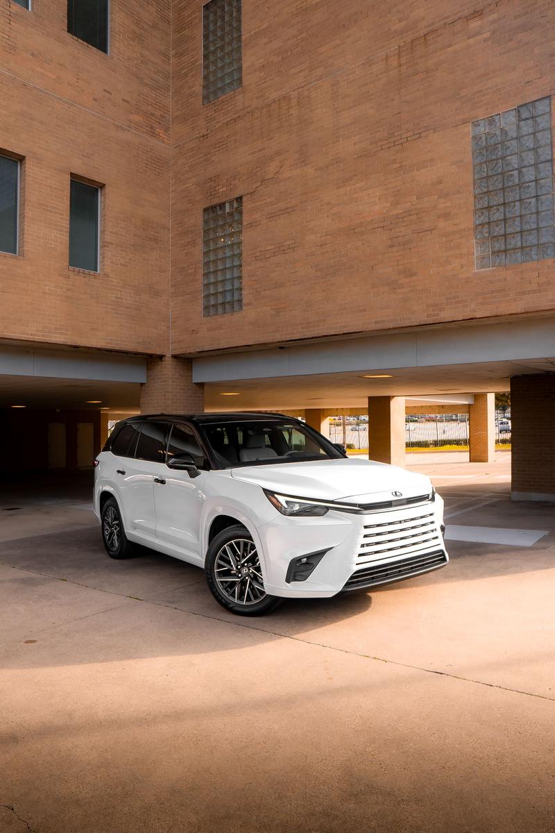 White SUV with black roof and trim, tuxedo style