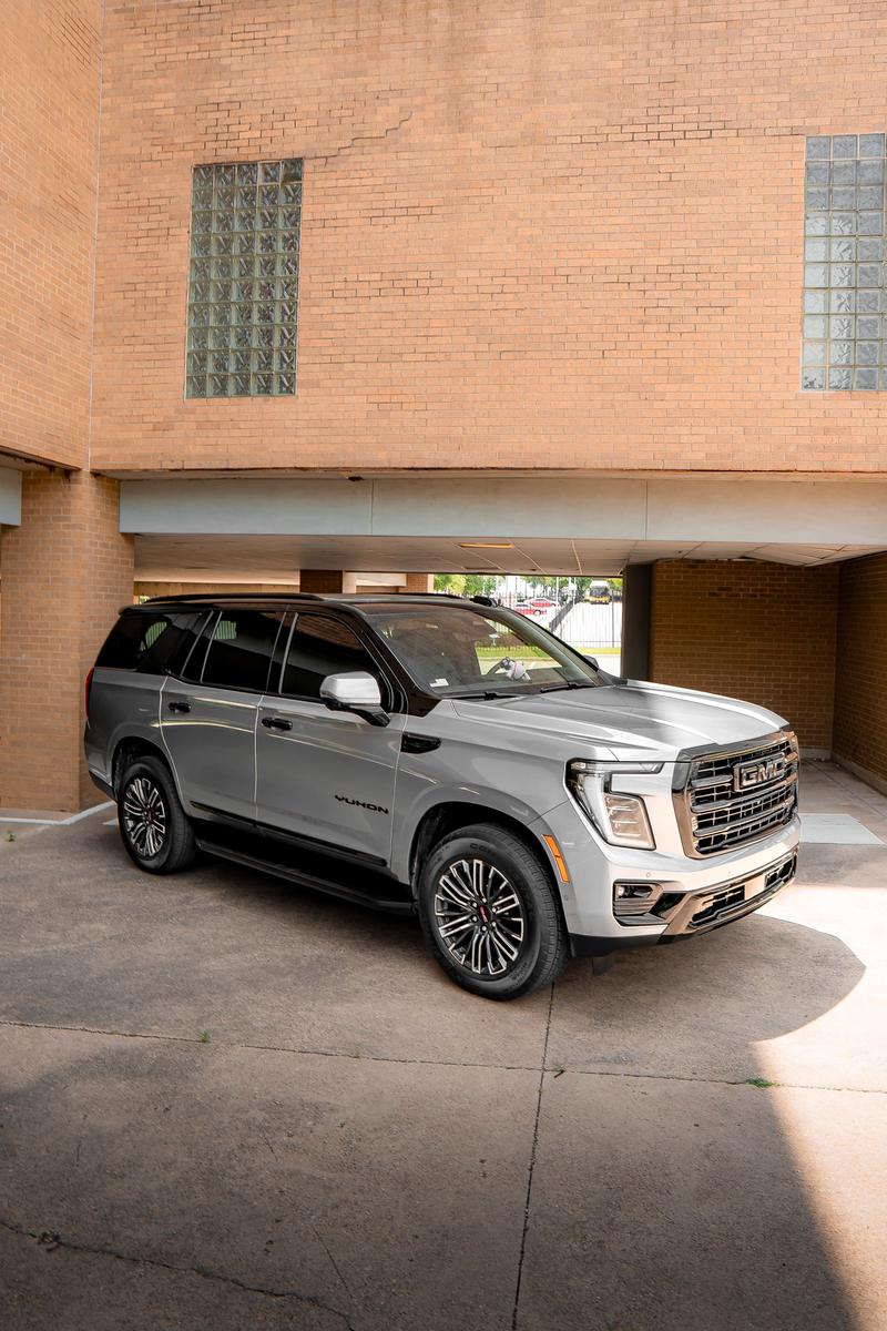 Dark two tone SUV outside the studio