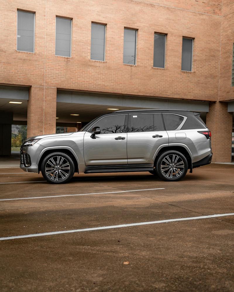 Silver SUV with tuxedo blackout package