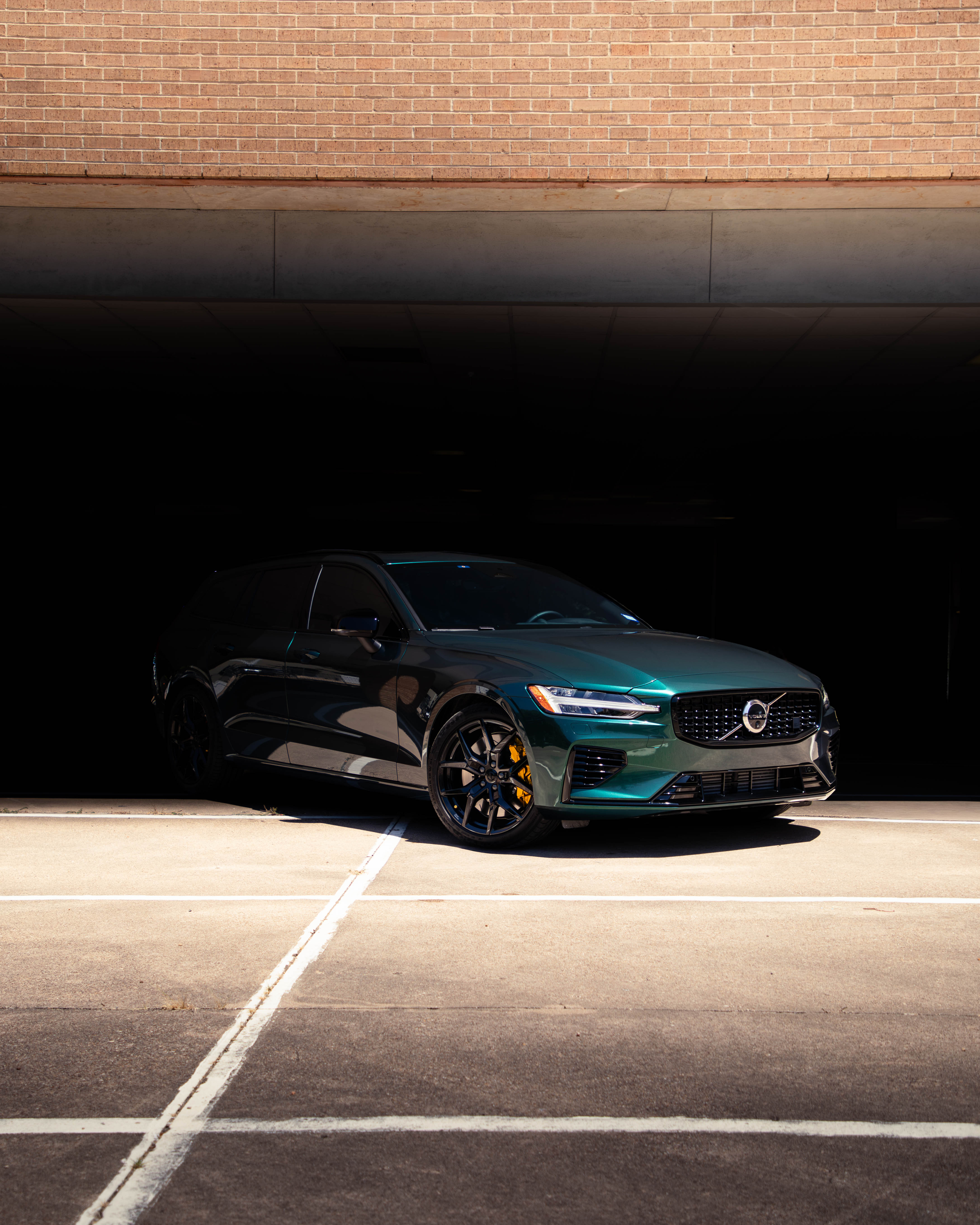Green color change wrap on a Volvo V60 wagon in Dallas